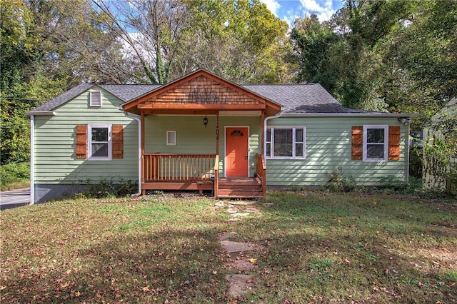 bungalow with a front yard