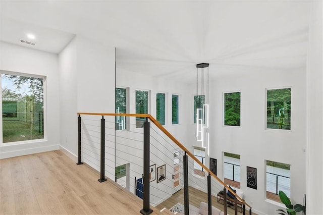 staircase featuring hardwood / wood-style flooring