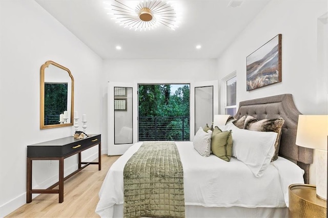 bedroom featuring light hardwood / wood-style flooring