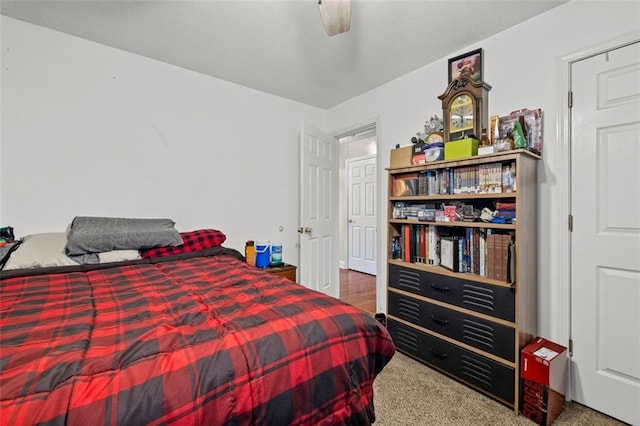 carpeted bedroom featuring ceiling fan