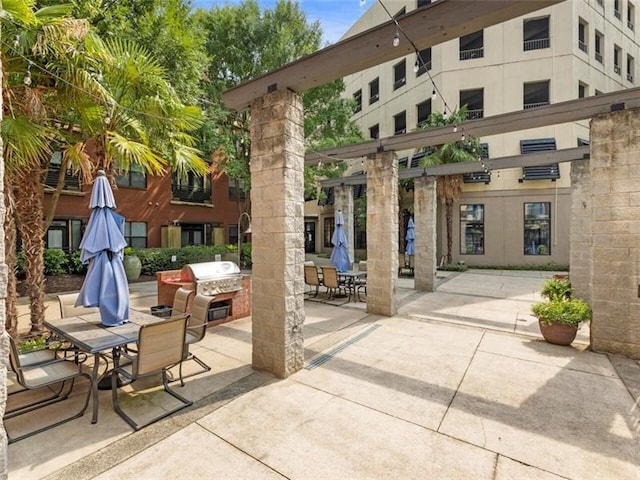 view of patio featuring a grill