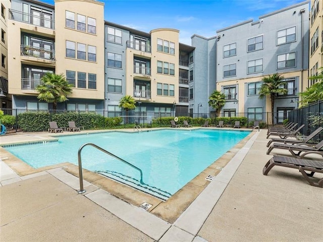 view of pool featuring a patio