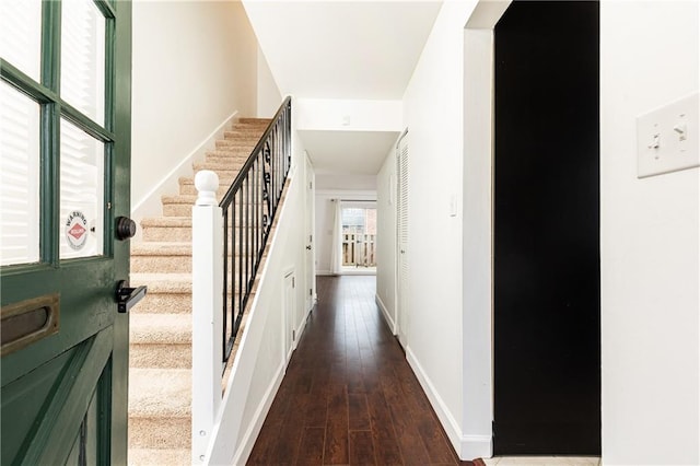 interior space with dark hardwood / wood-style floors