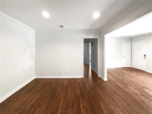 2122 Belhaven Ln SE, Atlanta, GA 30315 - spare room featuring ornamental molding, visible vents, recessed lighting, dark wood finished floors, and baseboards