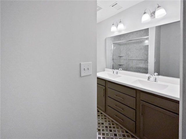 2122 Belhaven Ln SE, Atlanta, GA 30315 - full bath with a sink, walk in shower, double vanity, and visible vents