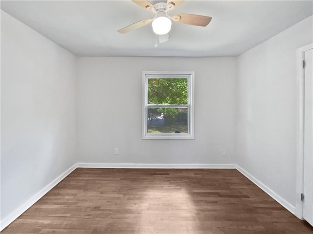2122 Belhaven Ln SE, Atlanta, GA 30315 - spare room featuring baseboards, a ceiling fan, and wood finished floors