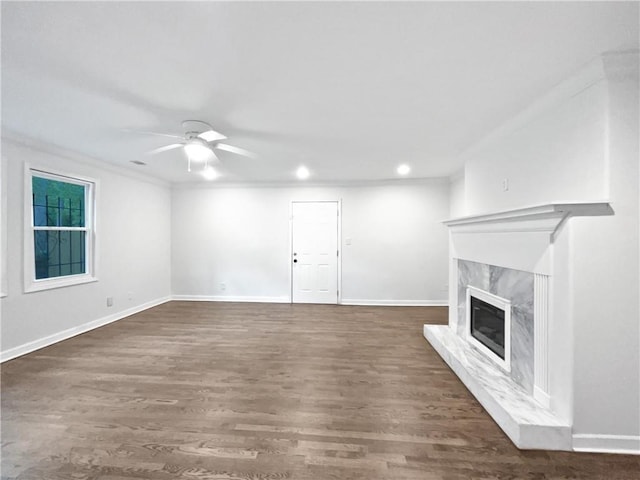 2122 Belhaven Ln SE, Atlanta, GA 30315 - unfurnished living room with wood finished floors, recessed lighting, a fireplace, ceiling fan, and baseboards