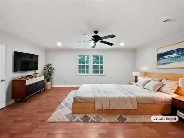 2122 Belhaven Ln SE, Atlanta, GA 30315 - bedroom with ceiling fan, recessed lighting, baseboards, wood finished floors, and visible vents