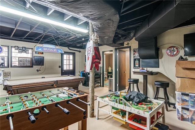 recreation room with concrete floors and pool table