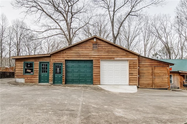 garage with wood walls