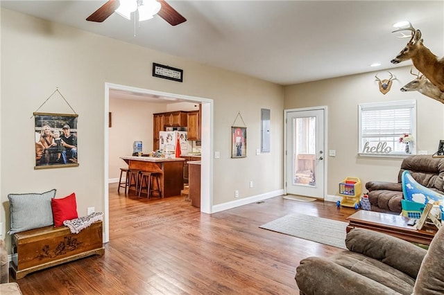 interior space featuring ceiling fan and hardwood / wood-style flooring