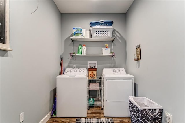 laundry room with washer hookup, independent washer and dryer, and dark hardwood / wood-style flooring