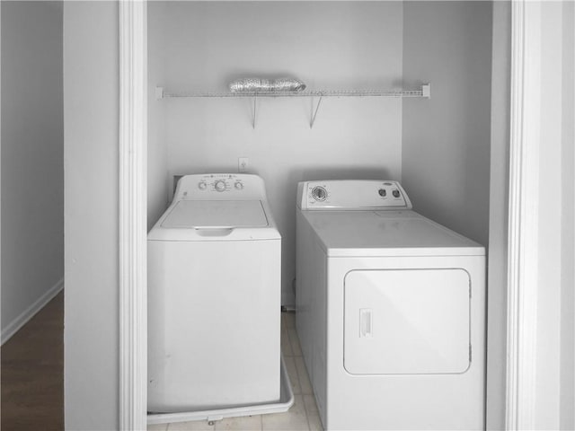 laundry room with washer and clothes dryer