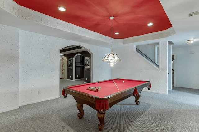 recreation room with billiards, a raised ceiling, and carpet