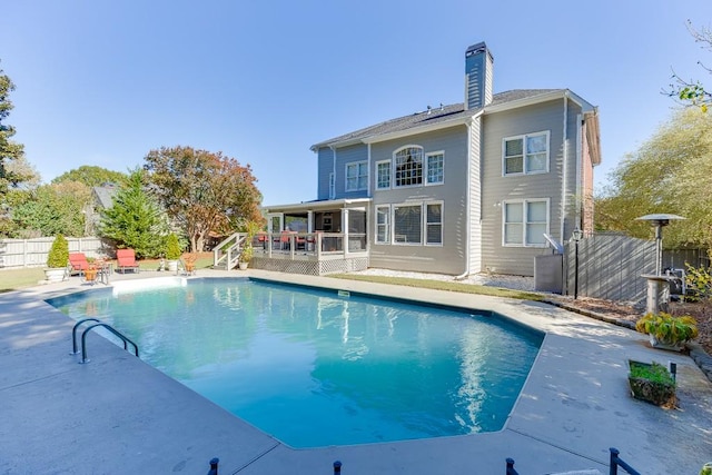 view of pool featuring a patio area