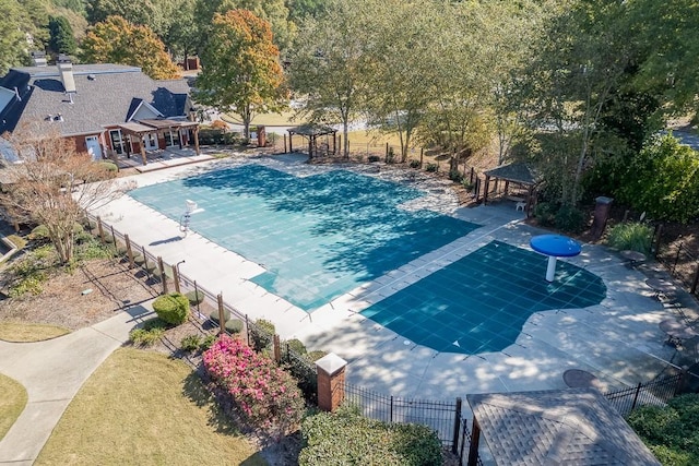 view of swimming pool with a gazebo and a patio area