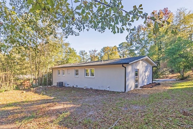 view of property exterior featuring central AC