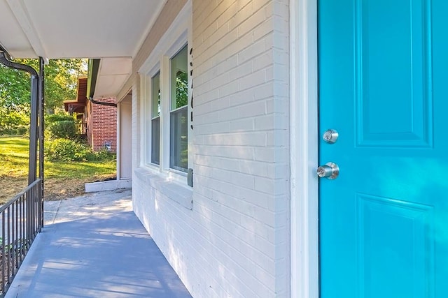 entrance to property with a porch