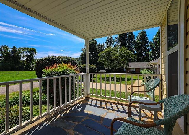 balcony featuring a sunroom