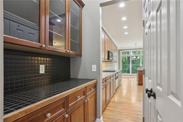 1215 Comet View Trl SE, Smyrna, GA 30082 - bar with recessed lighting, stainless steel microwave, light wood-type flooring, and tasteful backsplash