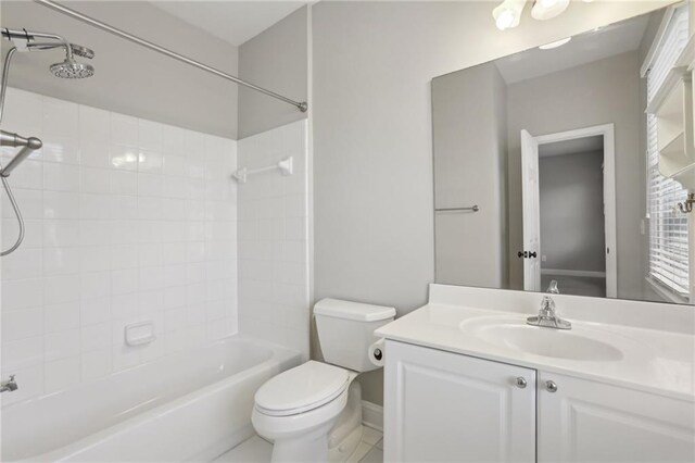 1215 Comet View Trl SE, Smyrna, GA 30082 - bathroom featuring shower / bath combination, baseboards, toilet, and vanity