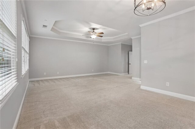 1215 Comet View Trl SE, Smyrna, GA 30082 - unfurnished room featuring visible vents, baseboards, ceiling fan with notable chandelier, light carpet, and a tray ceiling