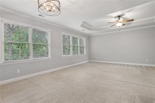 1215 Comet View Trl SE, Smyrna, GA 30082 - empty room featuring a raised ceiling, ornamental molding, carpet, and plenty of natural light