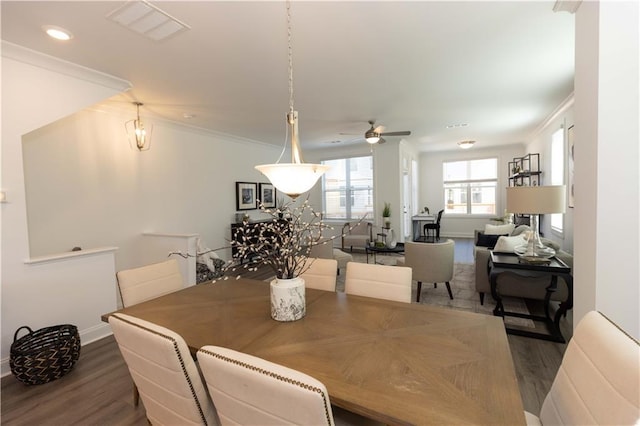 506 Healy Dr Unit 74, Cumming, GA 30040 - dining room featuring crown molding, a ceiling fan, baseboards, wood finished floors, and recessed lighting