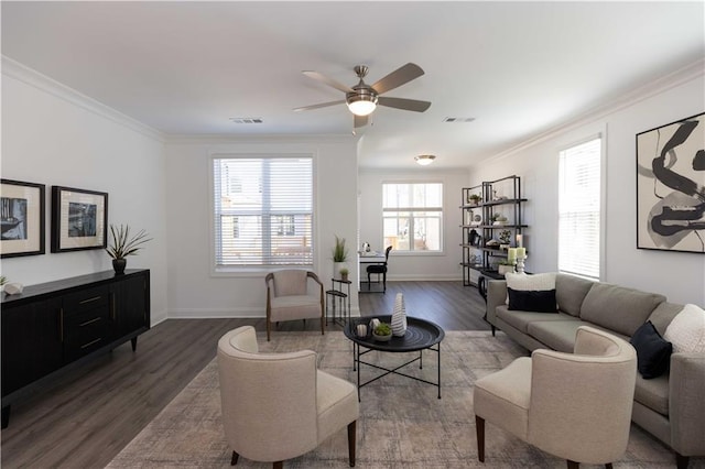506 Healy Dr Unit 74, Cumming, GA 30040 - living area featuring crown molding, wood finished floors, ceiling fan, and baseboards