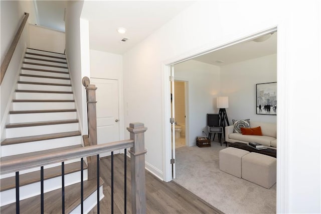 506 Healy Dr Unit 74, Cumming, GA 30040 - stairs with wood finished floors