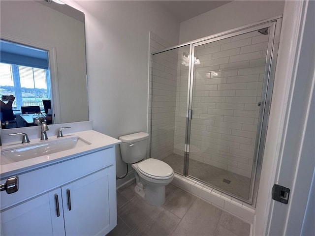 506 Healy Dr Unit 74, Cumming, GA 30040 - full bathroom featuring vanity, a shower stall, toilet, and tile patterned flooring