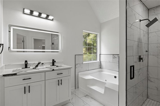 1069 Alford Rd, Lithonia, GA 30058 - full bath featuring marble look tile flooring, a stall shower, a garden tub, double vanity, and lofted ceiling
