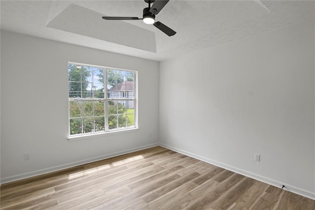 1069 Alford Rd, Lithonia, GA 30058 - empty room featuring a textured ceiling, light wood-style flooring, and ceiling fan
