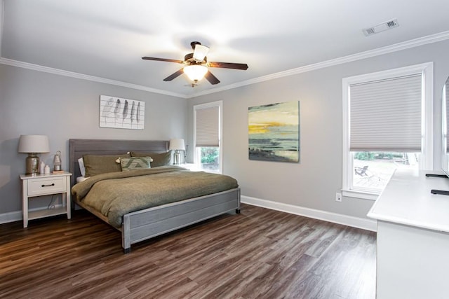 bedroom with ornamental molding, multiple windows, and visible vents