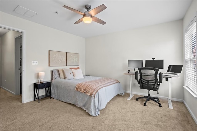 bedroom featuring visible vents, ceiling fan, carpet, and baseboards