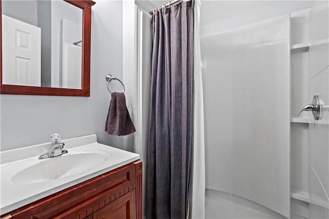 full bathroom featuring vanity and a shower with curtain