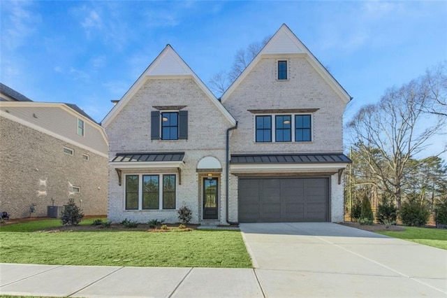 view of front of home with a garage, a front lawn, and central air condition unit