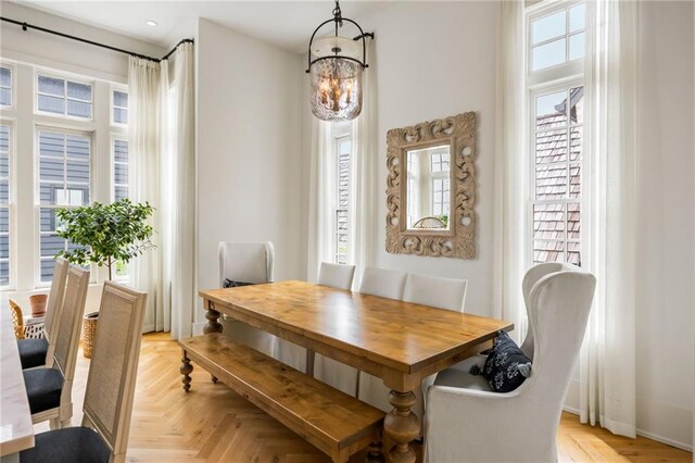 11277 Serenbe Ln, Chattahoochee Hills, GA 30268 - dining area featuring a chandelier and recessed lighting