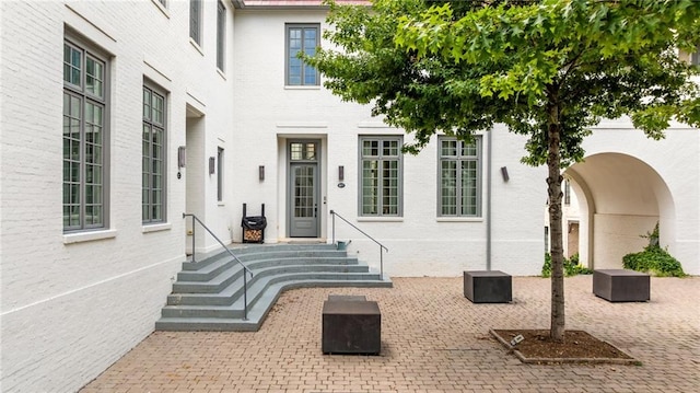 11277 Serenbe Ln, Chattahoochee Hills, GA 30268 - doorway to property featuring brick siding