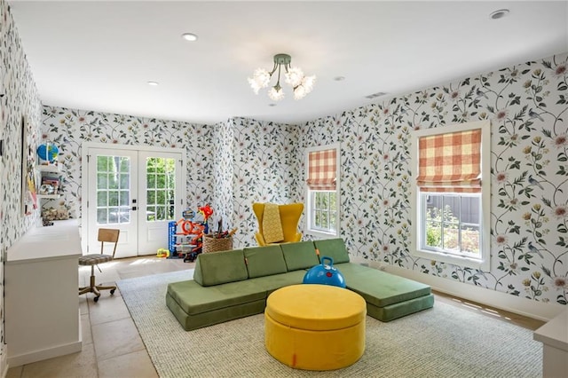 11277 Serenbe Ln, Chattahoochee Hills, GA 30268 - rec room with wallpapered walls, french doors, a chandelier, recessed lighting, and baseboards