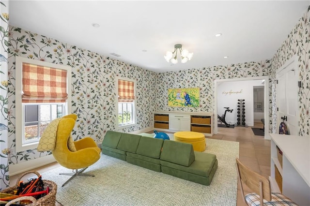 11277 Serenbe Ln, Chattahoochee Hills, GA 30268 - living room with wallpapered walls, a chandelier, and recessed lighting