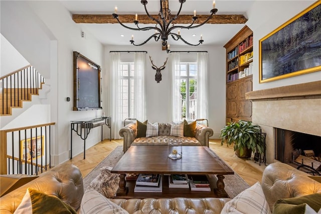 11277 Serenbe Ln, Chattahoochee Hills, GA 30268 - living area with a chandelier, a high end fireplace, beamed ceiling, stairs, and baseboards