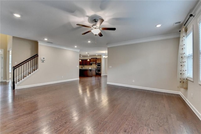 unfurnished living room with dark wood finished floors, a ceiling fan, recessed lighting, visible vents, and ornamental molding