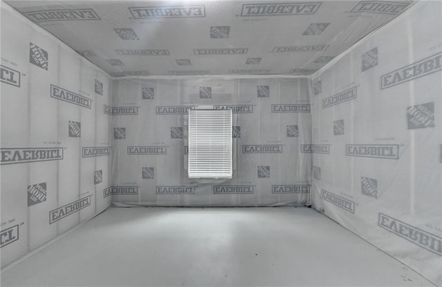 bathroom featuring concrete floors