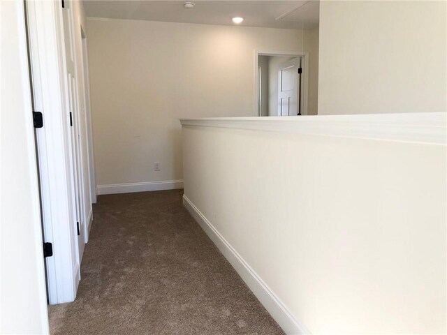 full bathroom with a sink, baseboards, and double vanity