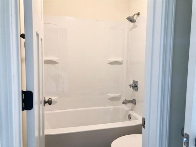 laundry room with hookup for an electric dryer, laundry area, washer hookup, baseboards, and dark wood-style floors