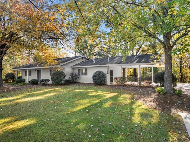 ranch-style house featuring a front yard