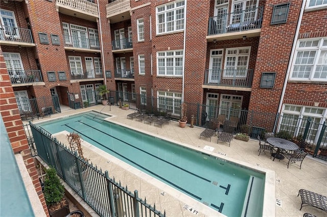 view of swimming pool featuring a patio