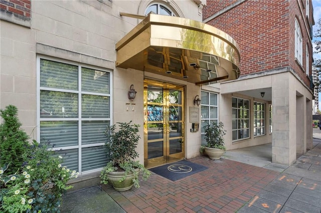 property entrance featuring french doors