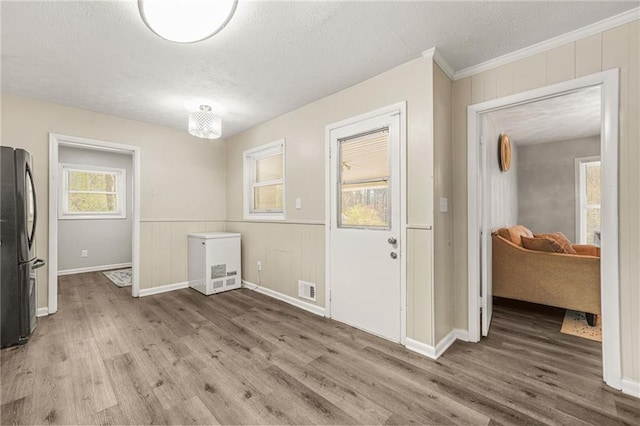 4218 Hideaway Dr, Tucker, GA 30084 - dining area featuring visible vents, wood finished floors, and a textured ceiling